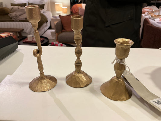 Ensemble de trois bougeoirs dorés